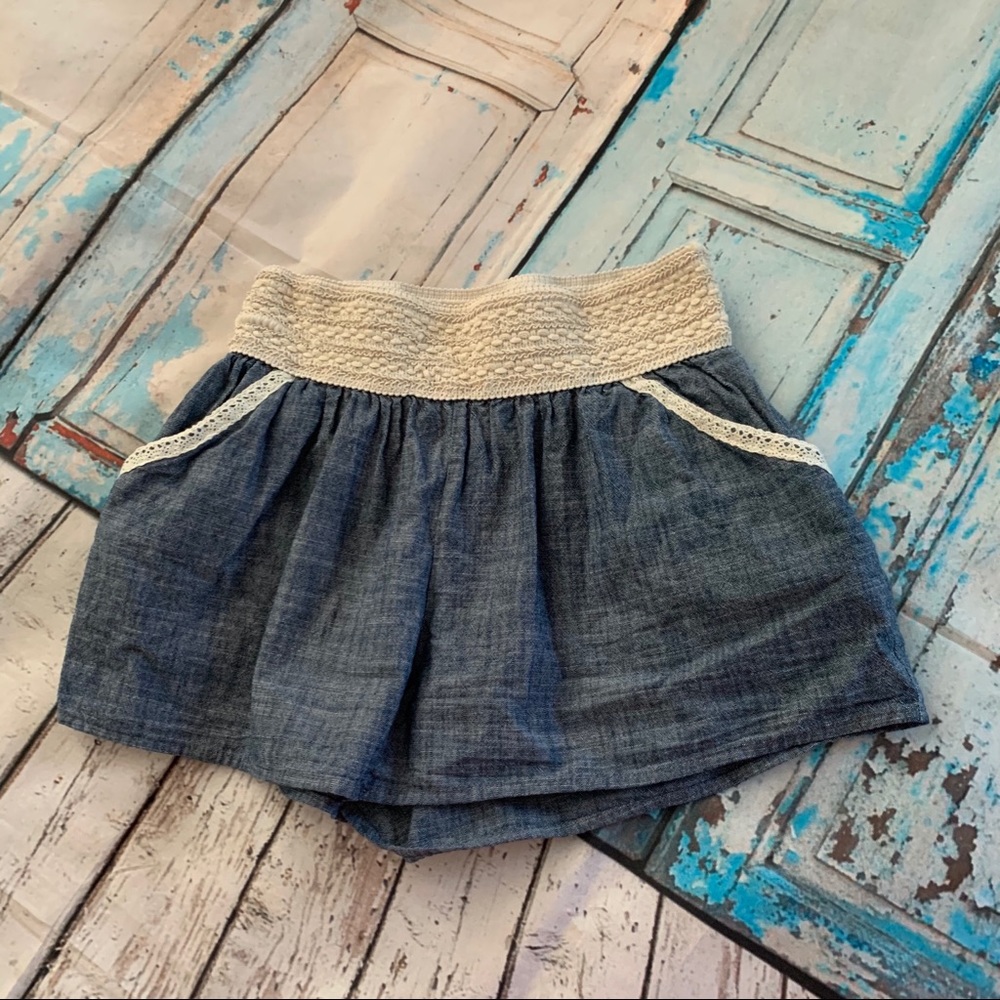 Ivory and denim colored shorts